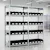 Racks with black storage containers in warehouse