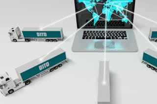 Laptop und LKW´s als Symbol zum Flottenmanagement